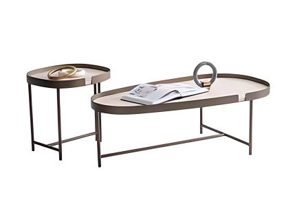Eleganter Couchtisch mit runder Form und stabilem Metallgestell.