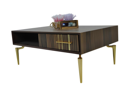 Stilvoller Couchtisch mit eleganten goldenen Beinen und Schublade