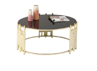 Goldfarbenes Metallgestell mit schwarzer Tischplatte - schön und zuverlässig