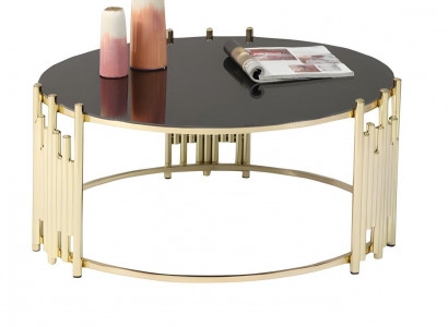 Goldfarbenes Metallgestell mit schwarzer Tischplatte - schön und zuverlässig