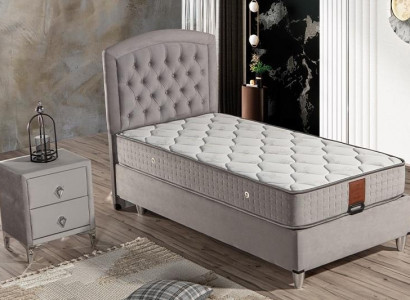 Elegantes graues Bett mit Matratze aus Textil und Edelstahl