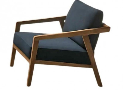 Ein Sessel in stilvollem Design Lakonisch. Gemütlich. Modern.