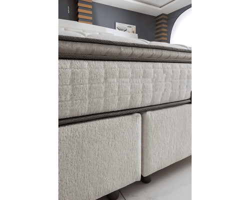 Elegantes Bett mit Matratze aus Textil in Beige