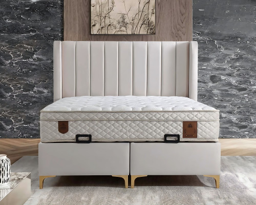 Elegantes Bett mit Matratze aus Textil in Beige