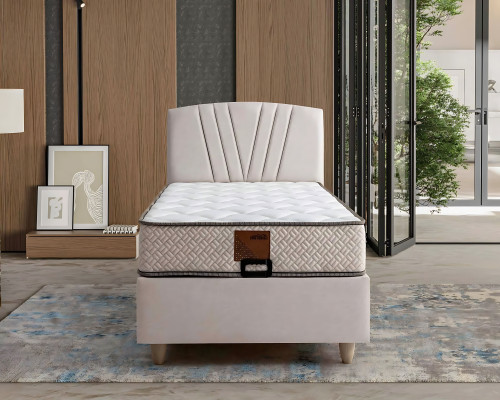 Elegantes Bett mit Matratze aus Textil in Beige