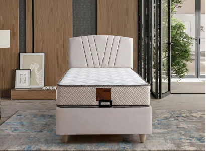 Elegantes Bett mit Matratze aus Textil in Beige