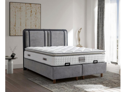 Das elegante und stabile Bett mit Matratze bringt Charme in die Einrichtung.