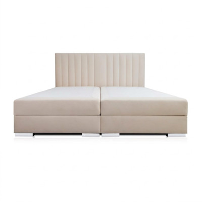 Comfortable and functional bed is made of high quality material in a modern style