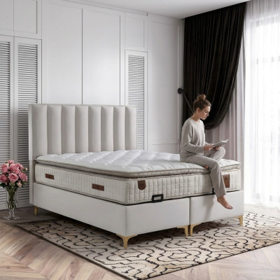 Elegantes Bett mit Matratze aus Textil in Beige