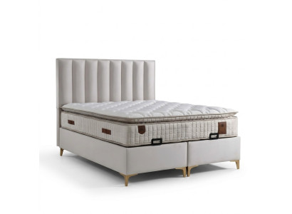 Elegantes Bett mit Matratze aus Textil in Beige
