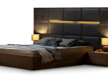 Das hohe, schicke Bett ist mit eleganten Textilien ausgestattet.