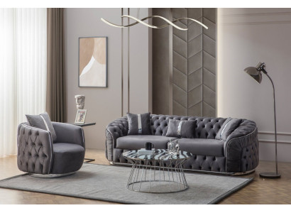 Das Sofa mit Sessel ergänzt die Einrichtung mit Ästhetik und Stil.