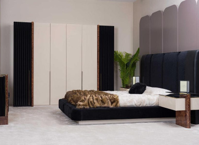 Das Schlafzimmer-Set (Bett + 2 Nachttische + Schrank) schafft Gemütlichkeit.