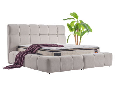 Massives Bett mit voluminösem Design hohem breitem Kopfteil in Grau